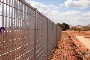 The Heavy Duty Metal Fencing that goes around all of Brule Marx Park in the Northwest of Brasilia, Brazil photo