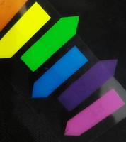 Tiny colorful sticky notes. photo