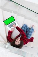 freelancer in bathrobe working from home photo