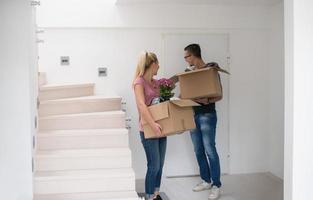 young couple moving into a new home photo