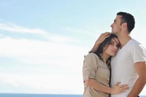 couple relaxing on balcony photo