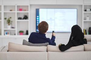 Young muslim couple enjoing time together at home during Ramadan photo