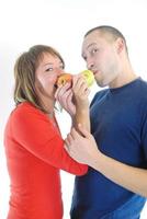 happy couple eating apples photo