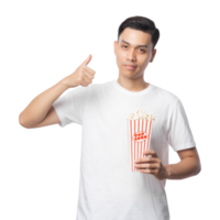 jeune homme asiatique tenant une découpe de pop-corn, fichier png