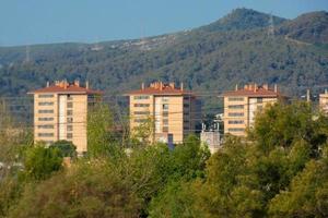 Housing developments on the outskirts of a large city photo