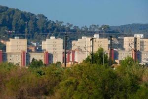 Housing developments on the outskirts of a large city photo