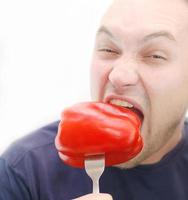 Eating bell pepper photo