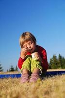 happy girl eating healthy food in nature photo