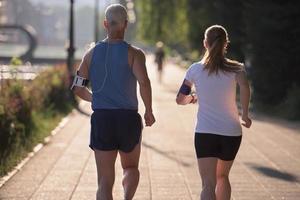 Couple jogging outside photo