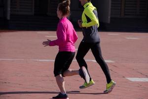 young  couple jogging photo