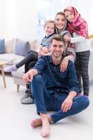 portrait of young happy modern muslim family photo