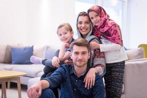 portrait of young happy modern muslim family photo