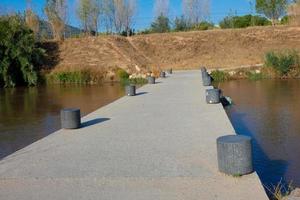 Flood bridge over the Llobregat river for sports people photo