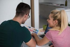 Young couple moving in a new home photo