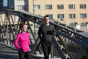 young  couple jogging photo