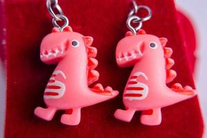 pink dinosaur earrings photo