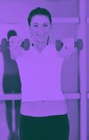 woman fitness workout with weights photo