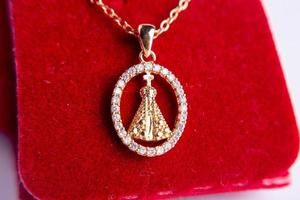 red velvet box with pearl necklace photo
