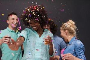 confetti party multiethnic group of people photo