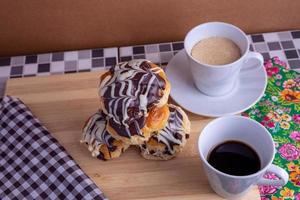 cup of coffee with brioche bread photo