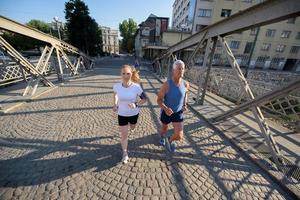 Couple jogging outside photo