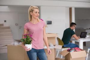 young couple moving into a new home photo