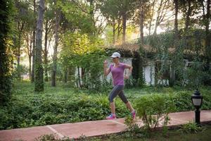 sporty woman jogging photo