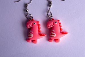 pink dinosaur earrings photo