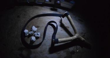 slingshot in dark photo