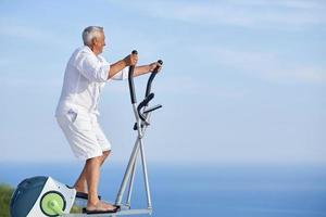 healthy senior man working out photo