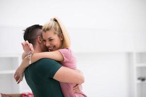 happy Young couple moving in new house photo