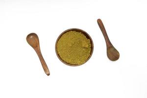 organic turmeric haldi powder on white background photo