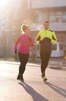 young  couple jogging photo