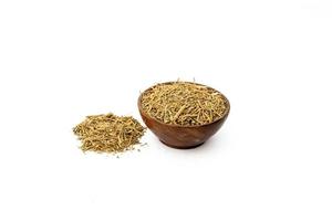 Ashwagandha or Aswaganda OR Indian Ginseng is an Ayurveda medicine Isolated on plain background photo