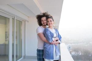 Couple hugging on the balcony photo