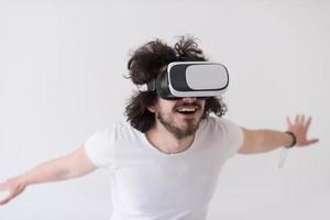 Man using headset of virtual reality photo