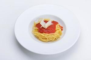 Italian spaghetti on white photo