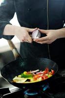 chef preparing meal photo