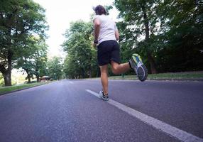 man jogging outside photo