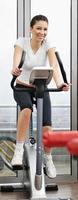 woman workout  in fitness club on running track photo