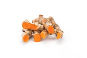 The yellow Turmeric Curcumin put on white background. It is a Thai herb and can put in Thai curry food. photo