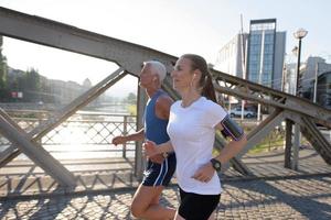 Couple jogging outside photo