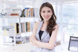 Pretty young business woman successful confidence photo