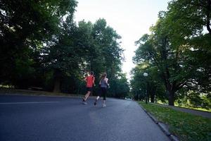 couple jogging outside photo