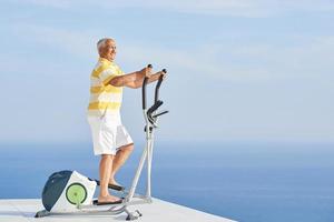 healthy senior man working out photo