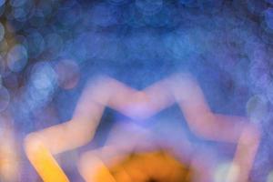 Blue and yellow bokeh lights for festive Christmas and New Year celebrations. photo