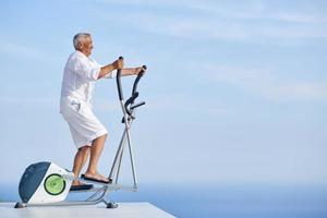 healthy senior man working out photo