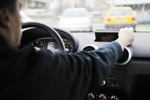 man using car navigation photo