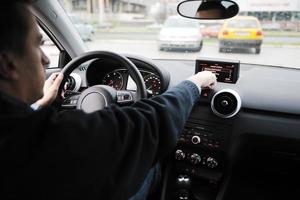 man using car navigation photo