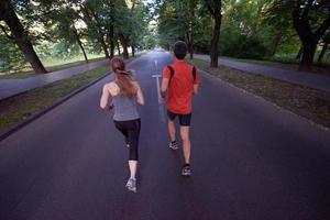 couple jogging outside photo